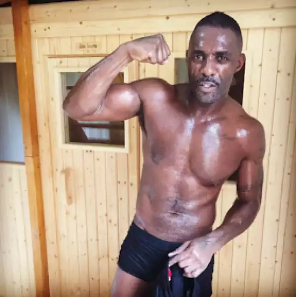 Idris Elba shows of his hot bod as he trains for a fight